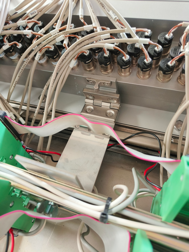 lots of cables and connectors for bullet valves in a manifold