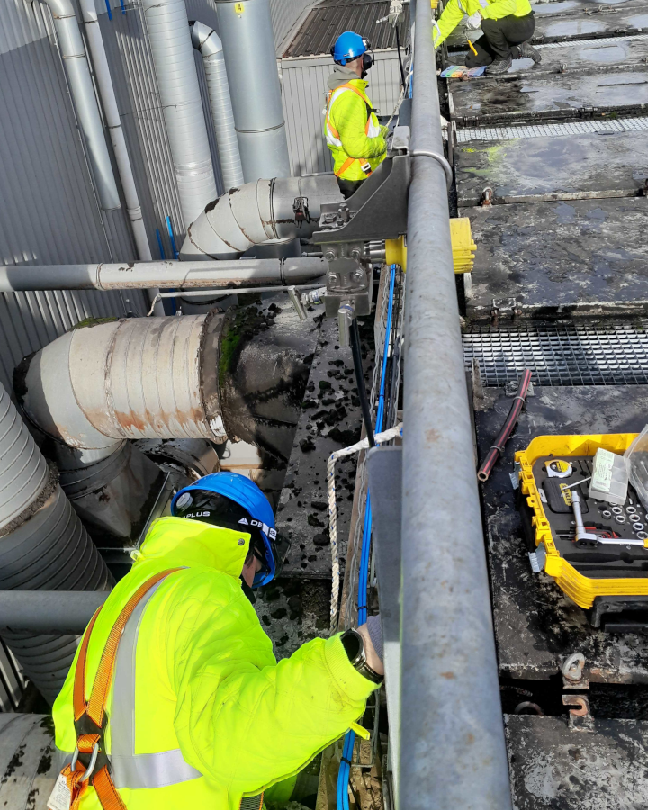 LDA technicians installing pneumatic valves