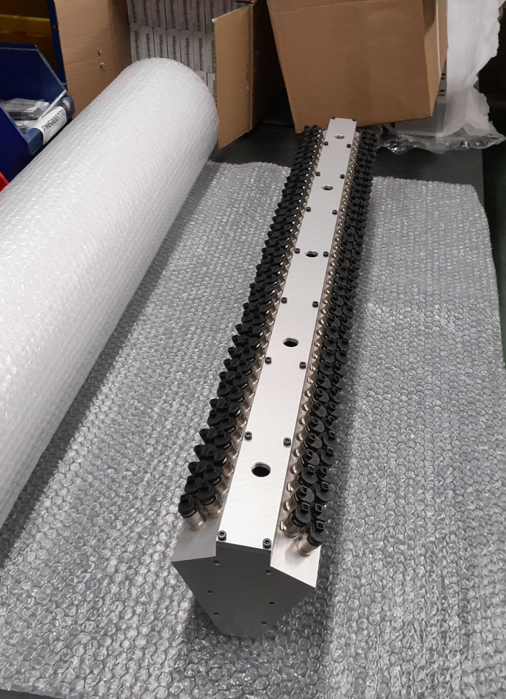 a long manifold with bullet valves